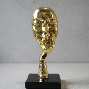 Sculpture "Le Penseur Doré" - Visage Abstrait en Métal Brillant